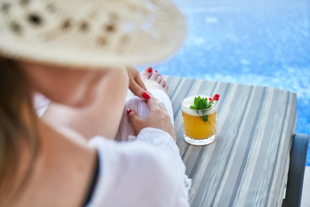 Relaxing by a clean pool